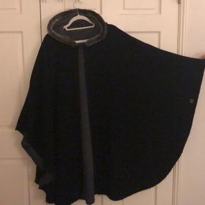 Reversible black faux fur-trimmed hooded cape